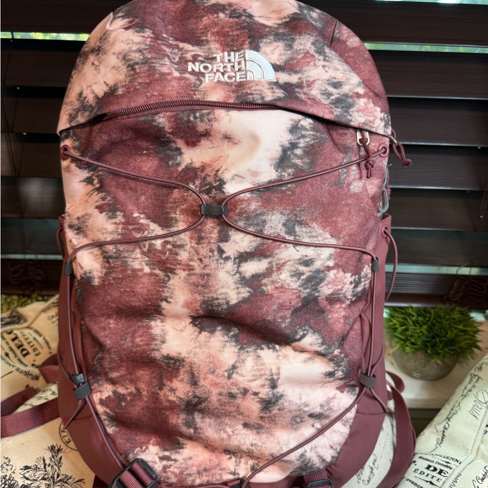 The North Face Women's Backpack in Maroon and Pink Tie-Dye.
